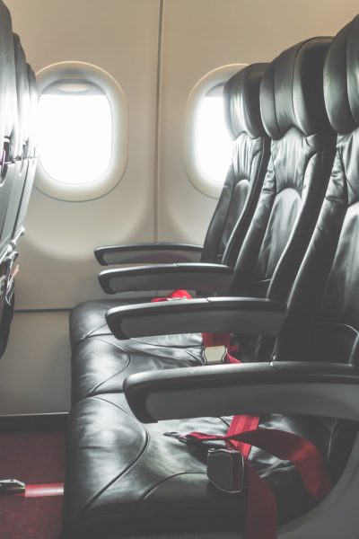 Airplane seats in the cabin ( Filtered image processed vintage effect. )